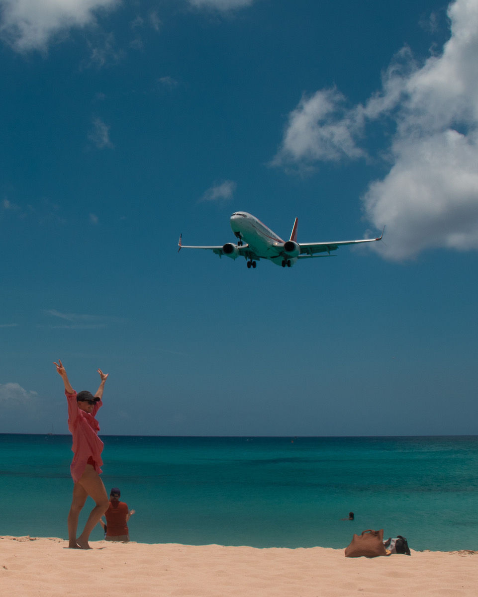 Maho Beach plane flying over women