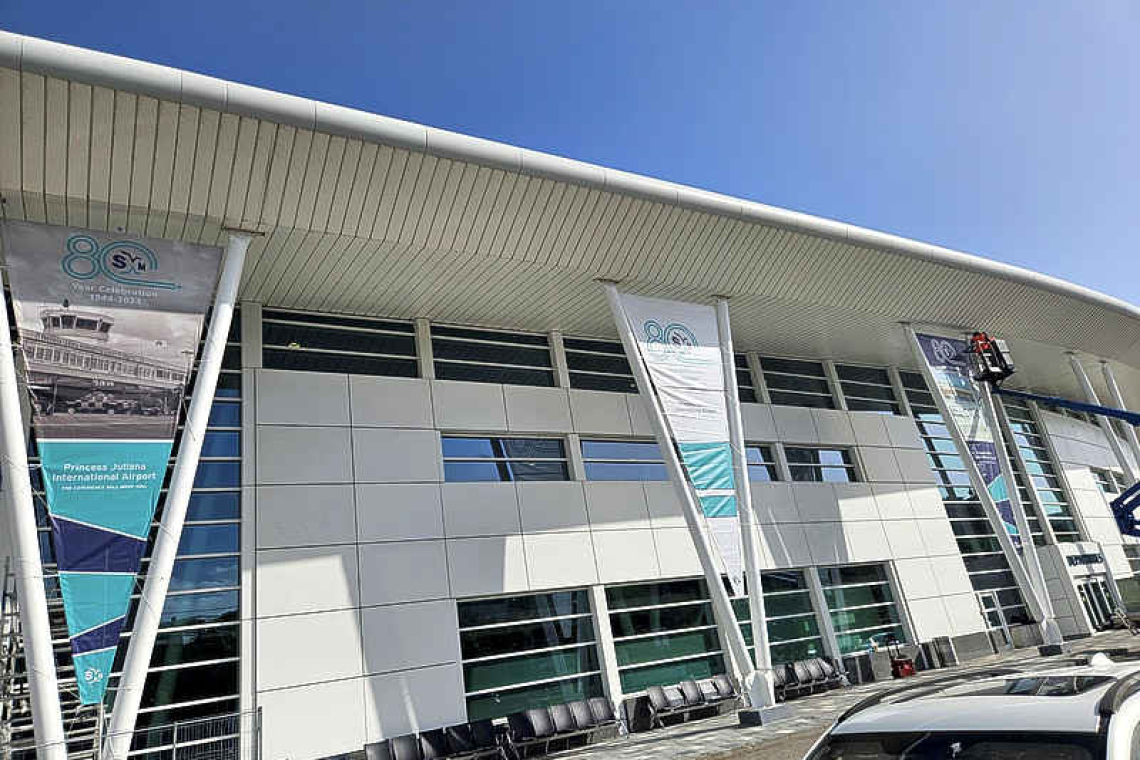 Big banners for the 80th anniversary of Princess Juliana International Airport