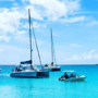 Three boats on the blue waters of St Maarten