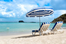 petite plage with two sunbeds on the beach