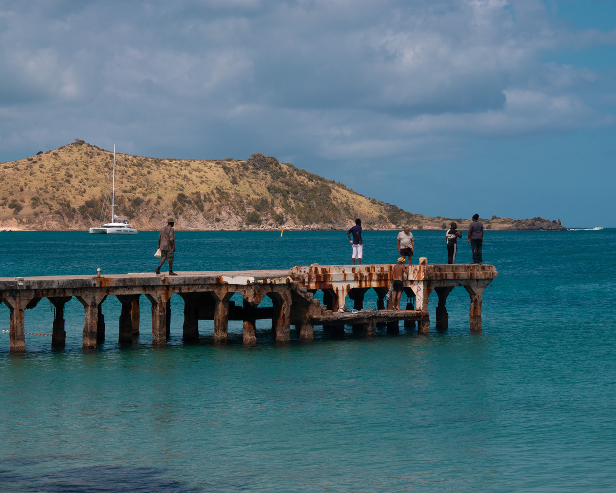 Grand Case Beach guys on the pier