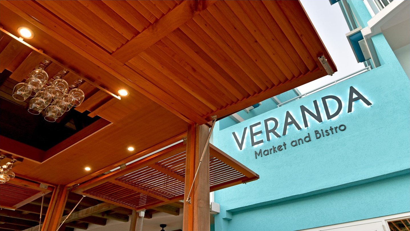 logo on the wall of veranda market and bistro