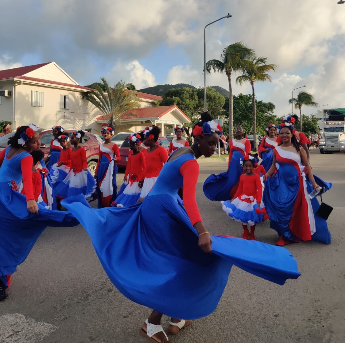 The cultural parade marching through the streets of Philipsburg on St Maarten's day