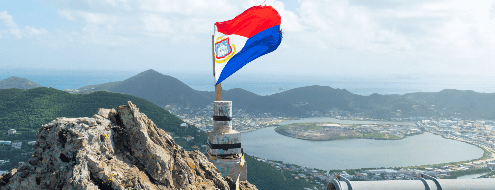 Gorgeous view from Sentry Hill St Maarten with Flag waving on top