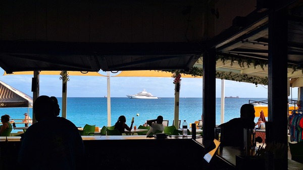 View of Mega Yacht Faith from D's Beach Bar