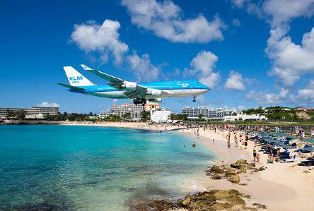 The KLM flying over the famous airplane beach in Maho