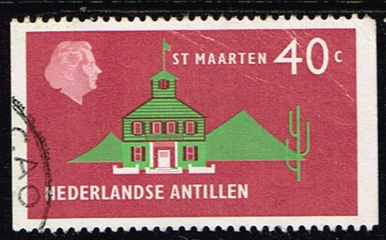 red coloured stamp with image of princess juliana on it